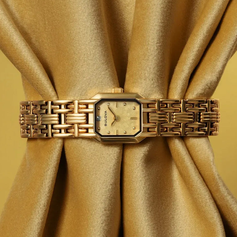 97P184 - Bulova Gold Quartz Sapphire Diamond